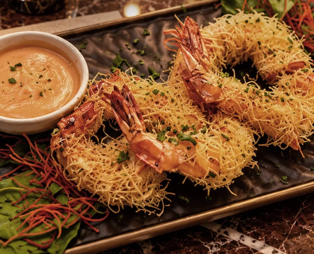 Crispy kataifi-wrapped prawns with sriracha mayo